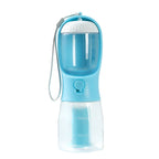 Portable blue pet water bottle with built-in bowl and measurement markings for dogs on the go