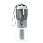 Portable pet water bottle with built-in bowl, 300ml capacity, gray and clear design for travel